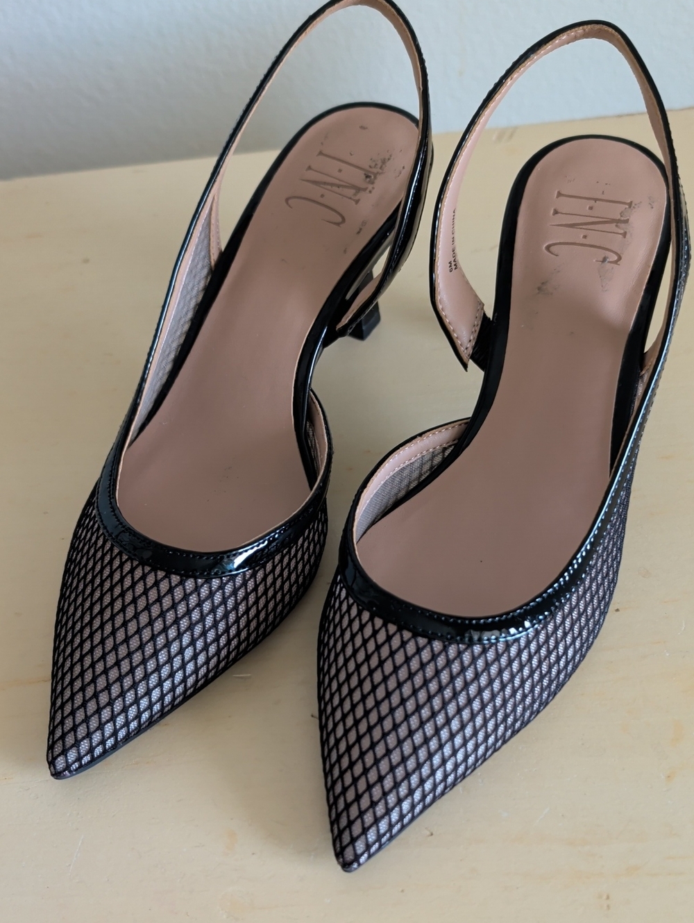 Black Mesh Tevy Slingback Pumps,